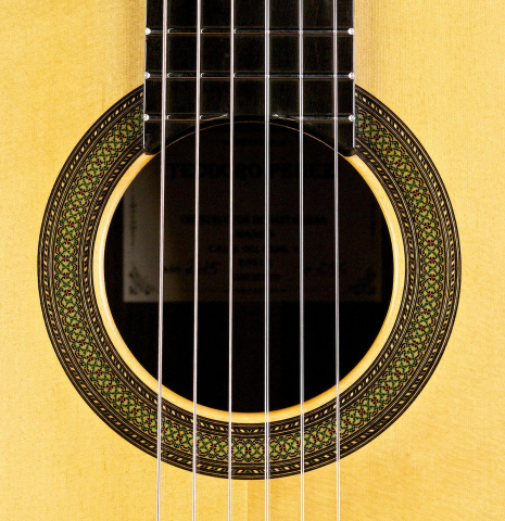 The rosette of a 2015 Teodoro Perez "Concierto" classical guitar made of spruce and Indian rosewood