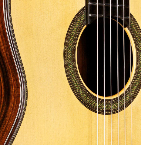 The soundboard of a 2015 Teodoro Perez "Concierto" classical guitar made of spruce and Indian rosewood