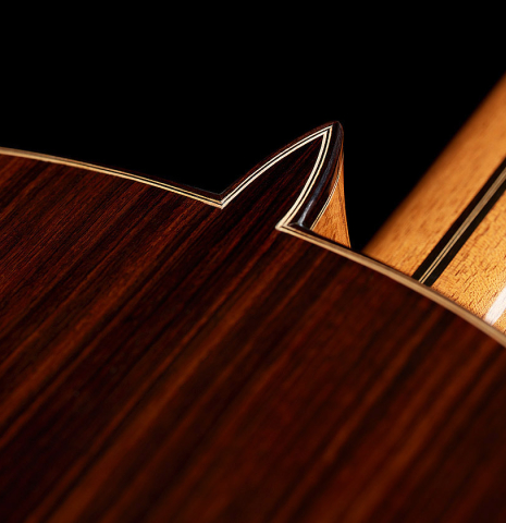 The heel, back binding and purfling of a 2024 Teodoro Perez "Concierto" classical guitar made of spruce and Indian rosewood