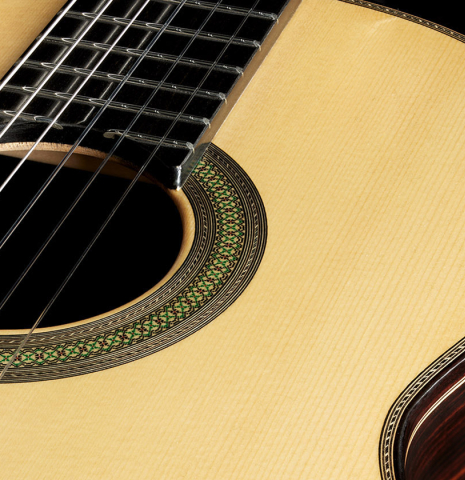 The top and rosette of a 2024 Teodoro Perez "Concierto" classical guitar made of spruce and Indian rosewood
