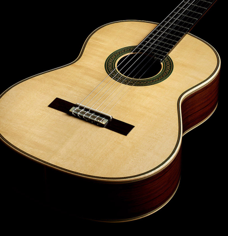 The soundboard of a 2025 Teodoro Perez "Especial" classical guitar made of spruce and African rosewood.