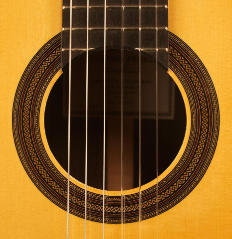 The rosette of a 2013 Teodoro Perez "Madrid" classical guitar made of spruce and Indian rosewood