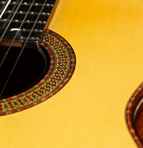 This is the rosette and soundboard of a 2015 Teodoro Perez &quot;Especial&quot; classical guitar made with spruce and cocobolo