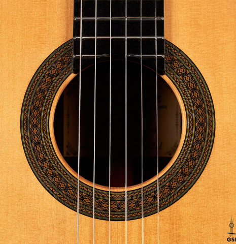 The rosette of a 2022 Teodoro Perez &quot;Especial&quot; classical guitar made of spruce and cocobolo