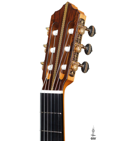 The headstock and machine heads of a 2020 Erez Perelman classical guitar made of spruce and cypress