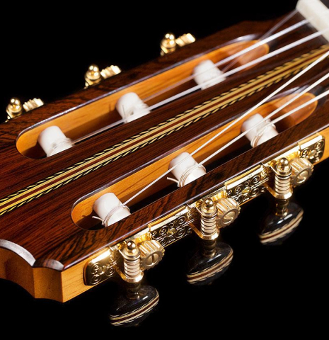 The headstock of a 2020 Erez Perelman classical guitar made of spruce and cypress