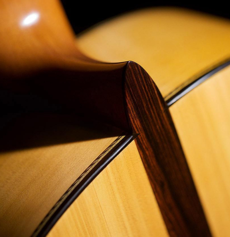 The central strip and heel of a 2020 Erez Perelman classical guitar made of spruce and cypress