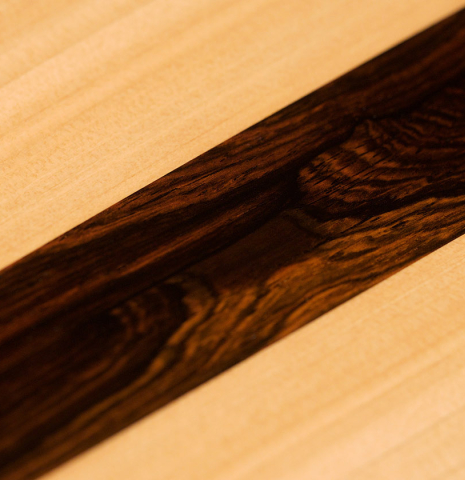 The back and central back strip of a 2021 Erez Perelman classical guitar made of spruce and cypress