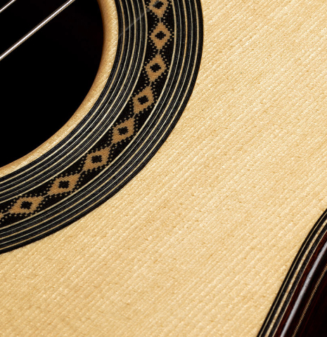 The top and rosette detail of a 2024 Teodoro Perez "Antigua" classical guitar made of spruce and African rosewood