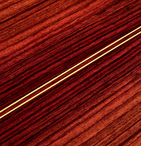 The close-up of the rosette of a 2022 Teodoro Perez "Estudio C-650" model made with cedar and Indian rosewood