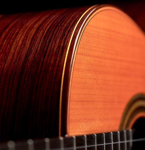 This is the side and binding of a 2022 Teodoro Perez "Estudio C-650" model made with cedar and Indian rosewood