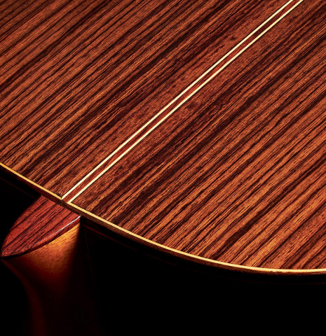 Closeup of the back and heel of a 2023 Teodoro Perez "Estudio C-650" classical guitar made of cedar and Indian rosewood.