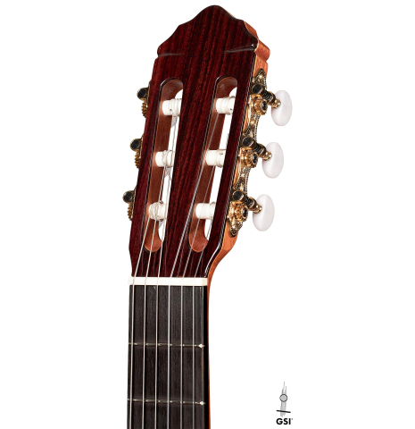 The headstock of a 2023 Teodoro Perez "Estudio C-650" classical guitar made of cedar and Indian rosewood on a white background.
