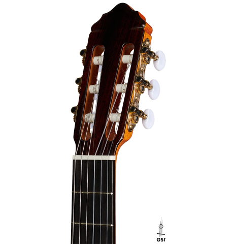 The headstock of a 2024 Teodoro Perez "Estudio C-650" classical guitar made of cedar and Indian rosewood on a white background.
