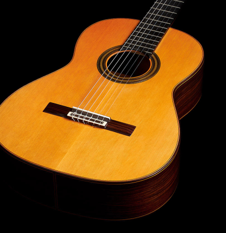 The top and sides of a 2024 Teodoro Perez "Estudio C-650" classical guitar made of cedar and Indian rosewood.