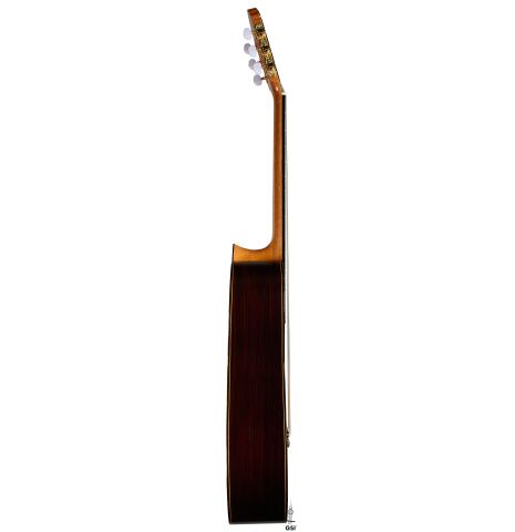 The side of a 2025 Teodoro Perez "Estudio C-650" classical guitar made of cedar and Indian rosewood.