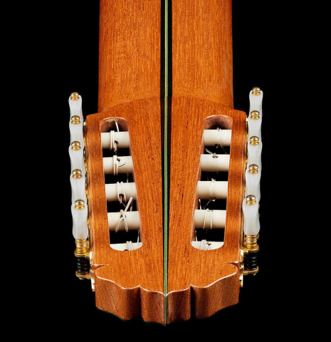 The back of the headstock of a 2006 Teodoro Perez "Maestro 10-string" classical guitar made of spruce and African rosewood