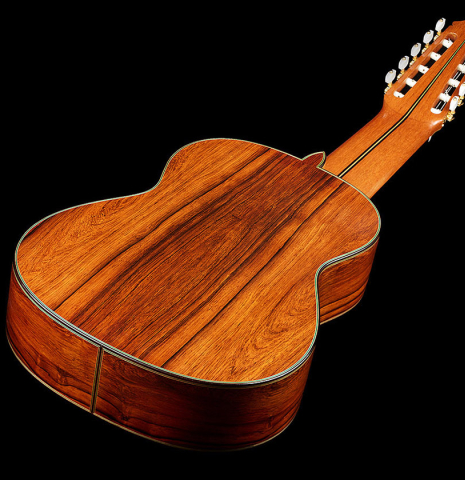 The back and sides of a 2006 Teodoro Perez "Maestro 10-string" classical guitar made of spruce and African rosewood