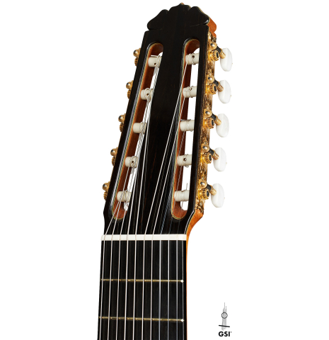 The headstock of a 2006 Teodoro Perez "Maestro 10-string" classical guitar made of spruce and African rosewood