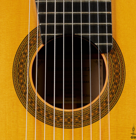 The rosette of a 2006 Teodoro Perez "Maestro 10-string" classical guitar made of spruce and African rosewood