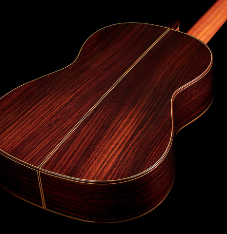 The back of a 2023 Teodoro Perez "Estudio C-650" classical guitar made of spruce and Indian rosewood.