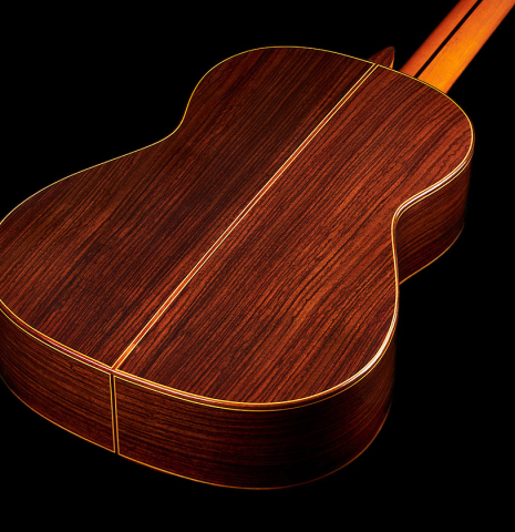 The back and sides of a 2024 Teodoro Perez "Estudio C-650" classical guitar made of spruce and Indian rosewood.