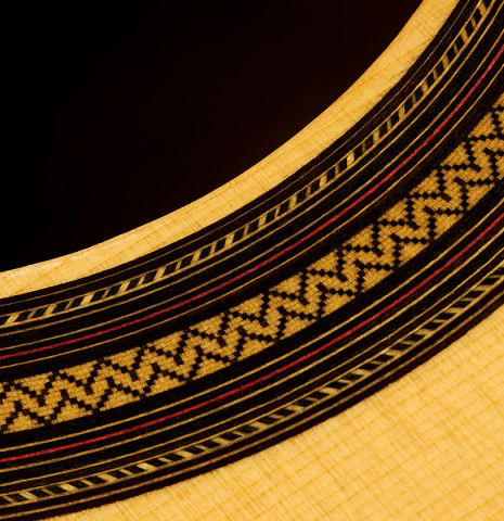Detail of the rosette of a 2024 Teodoro Perez "Estudio C-650" classical guitar made of spruce and Indian rosewood.