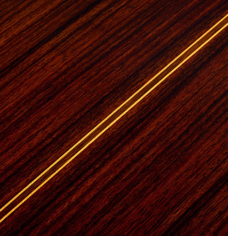 The back center seam of a 2025 Teodoro Perez "Estudio C-650" classical guitar made of spruce and Indian rosewood