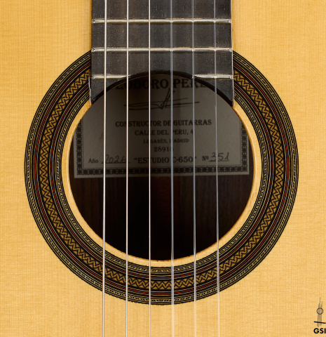 The rosette of a 2026 Teodoro Perez "Estudio C-650" classical guitar made of spruce and Indian rosewood