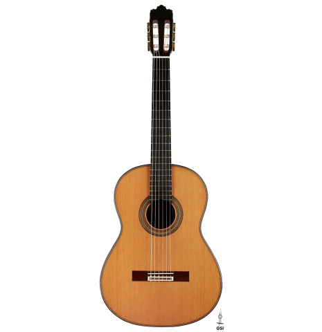 The front of a 2023 Sergio Perez "Segovia" model of classical guitar made of cedar and green ebony. 