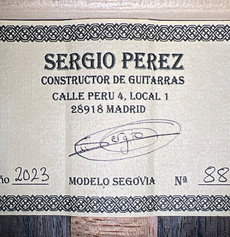 The label of a 2023 Sergio Perez "Segovia" model of classical guitar made of cedar and green ebony. 