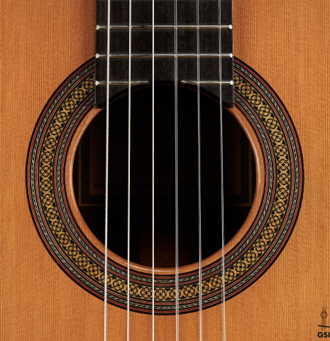 The rosette of a 2023 Sergio Perez "Segovia" model of classical guitar made of cedar and green ebony. 