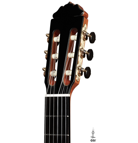 The headstock of a 2023 Teodoro Perez "Antigua" classical guitar made of cedar and Indian rosewood.