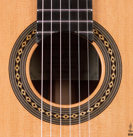 The rosette of a 2021 Teodoro Perez "Antigua" classical guitar made with cedar top and African rosewood back and sides.