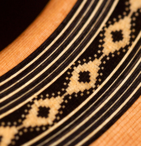 The rosette of a 2021 Teodoro Perez "Antigua" classical guitar made with cedar top and African rosewood back and sides.