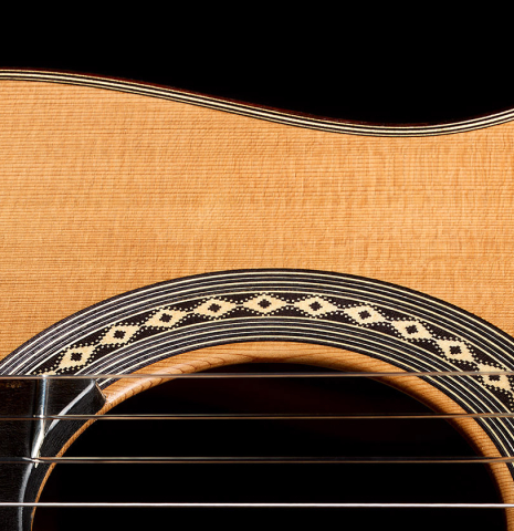 The soundboard and rosette of a 2026 Teodoro Perez "Antigua" classical guitar made of cedar and African rosewood