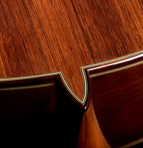 The heel, back binding and purfling of a 2026 Teodoro Perez "Antigua" classical guitar made of cedar and African rosewood