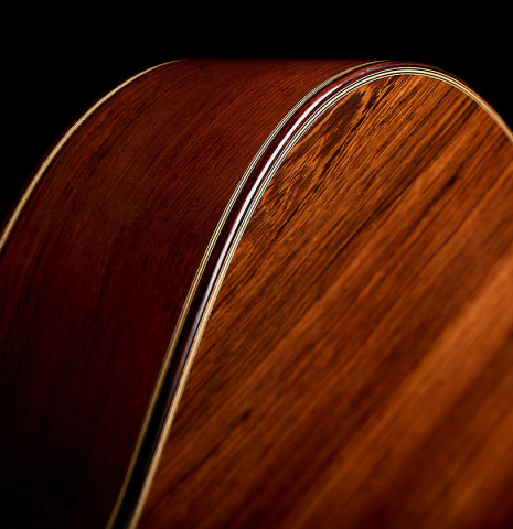 The ribs, back binding and purfling of a 2026 Teodoro Perez "Antigua" classical guitar made of cedar and African rosewood