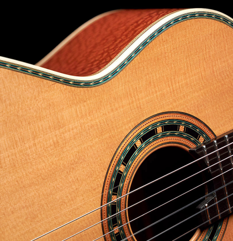 The soundboard and binding of a 2022 Teodoro Perez &quot;Especial&quot; classical guitar model made with cedar and Brazilian lacewood