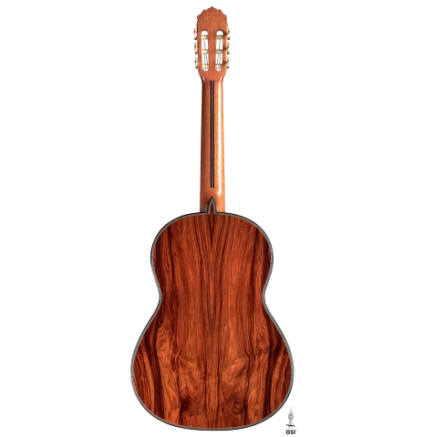 The back of a 2023 Teodoro Perez &quot;Especial&quot; classical guitar made of cedar and pau ferro against a white background