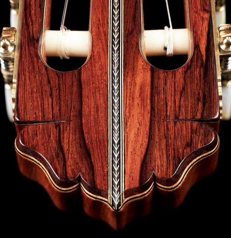 The top of the headstock of a 2023 Teodoro Perez &quot;Especial&quot; classical guitar made of cedar and pau ferro