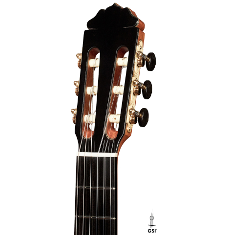 The headstock of a 2023 Teodoro Perez "Antigua" classical guitar made of spruce and Indian rosewood on a white background.