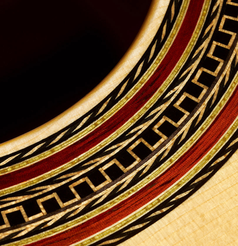 Detail of the rosette of a 2023 Erez Perelman classical guitar made of spruce and birdseye maple