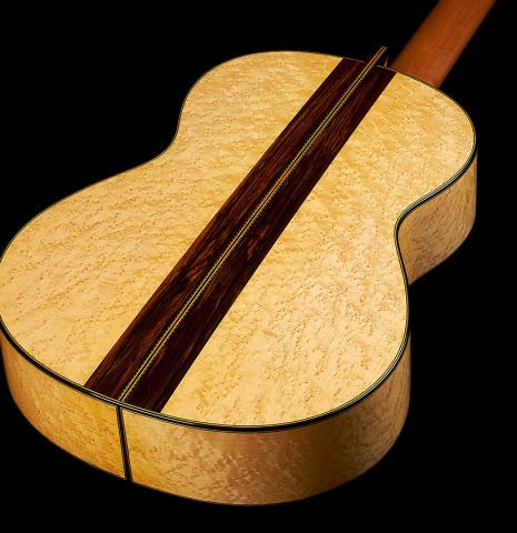 The back and sides of a 2023 Erez Perelman classical guitar made of spruce and birdseye maple