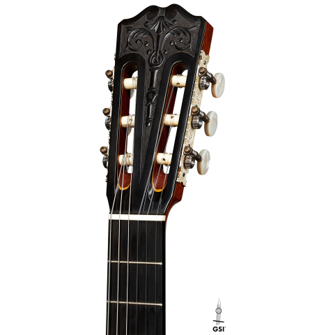 The headstock of a 2007 Daryl Perry "Simplicio" classical guitar made with spruce and satinwood