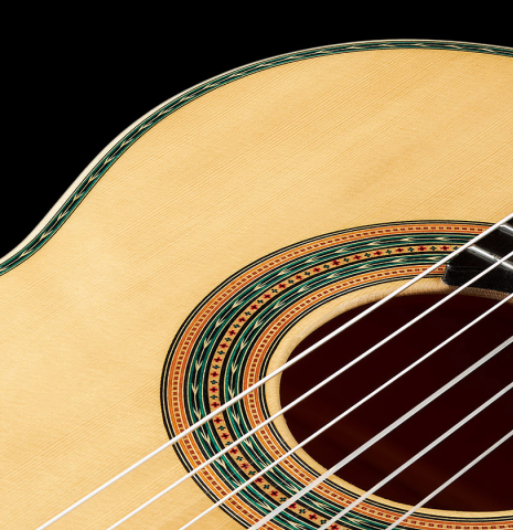 The soundboard and rosette of a 2024 Teodoro Perez "Especial" classical guitar made of spruce and Bubinga