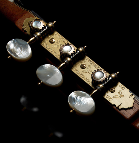 The headstock and tuning machines of a 2024 Teodoro Perez "Especial" classical guitar made of cedar and African ebony