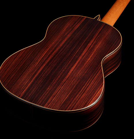 The back and sides of a 2024 Sergio Perez "Segovia" classical guitar made of spruce and Indian rosewood.
