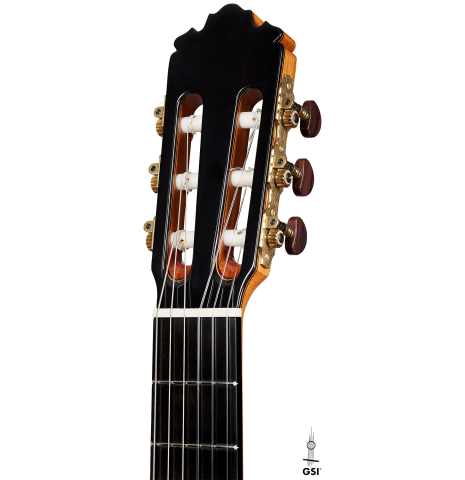 The headstock of a 2024 Sergio Perez "Segovia" classical guitar made of spruce and Indian rosewood.