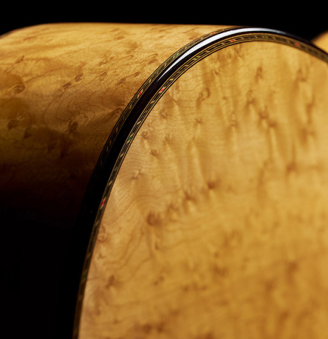 The back binding and purfling of a 2024 Teodoro Perez "Especial" classical guitar made of spruce and maple
